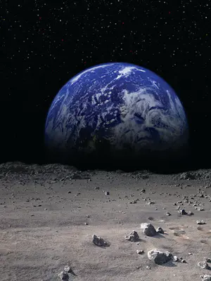 moon landscape with the earth on the horizon